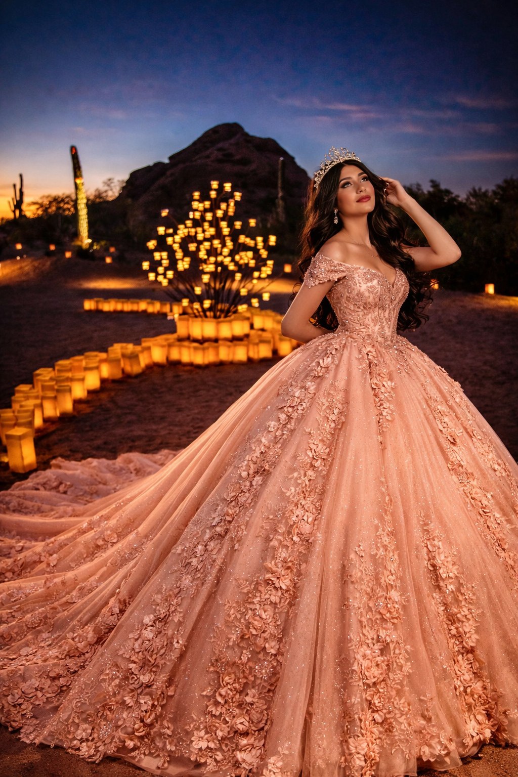 Outdoor portrait in a pink dress and crown in the desert with candles